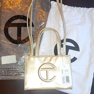 BRAND NEW (NEVER WORN) GOLD SMALL TELFAR SHOPPING BAG